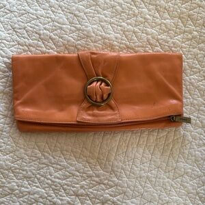 Hobo international orange colored leather clutch / wallet